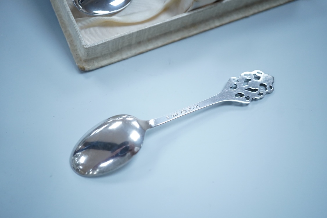 Small silver including a three piece cruet set, by George Howson, Sheffield, 1924/5/6, a napkin ring, a cream jug and a set of six 830s coffee spoons.